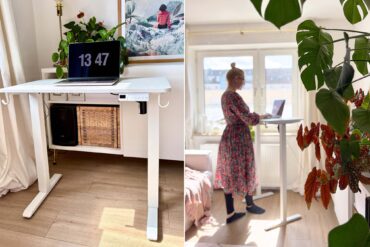 Person arbeitet im Stehen am kleinen höhenverstellbaren Schreibtisch am Fenster im Wohnzimmer